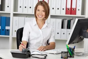 Photo of oral surgery front desk staff