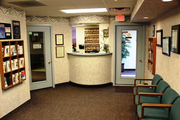 Interior oral surgery practice photo: Reception desk and room for Oral & Maxillofacial Surgery Center in Warminster PA