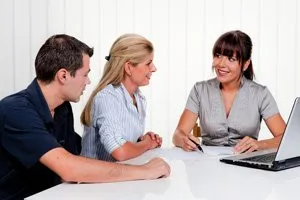 Photo of oral surgery office staff helping patients maximize insurance benefits