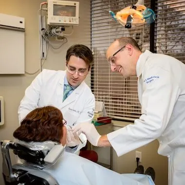 Dentists checking a patient