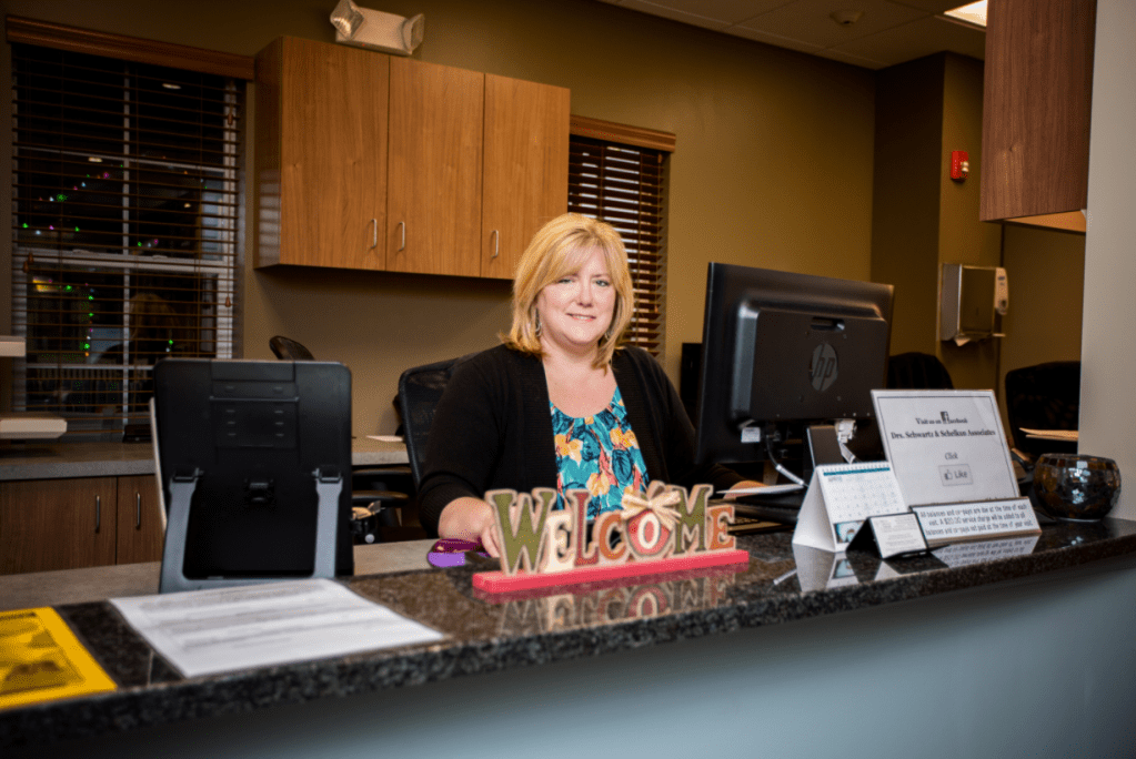 Receptionist and desk interior photo of Newton PA oral surgery center