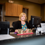 Receptionist and desk interior photo of Newton PA oral surgery center