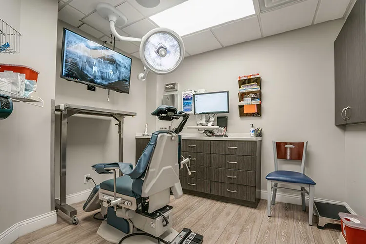 Patient chair and treatment room for Fort Washington PA oral surgery practice Oral & Maxillofacial Surgery Center