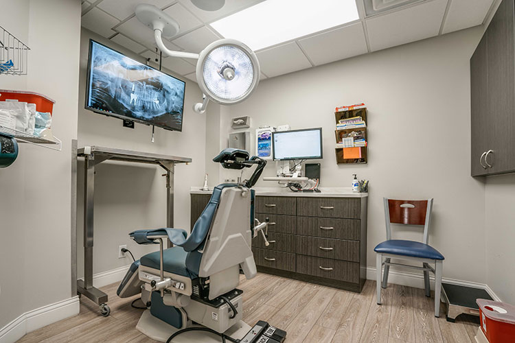 Patient chair and treatment room for Fort Washington PA oral surgery practice Oral & Maxillofacial Surgery Center