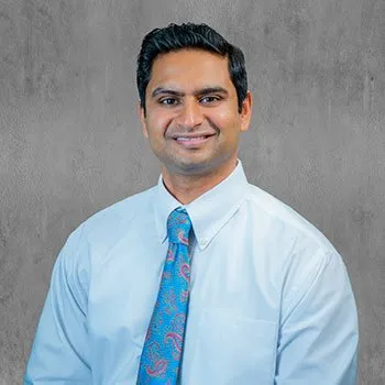 Dr. Gunawardena smiling